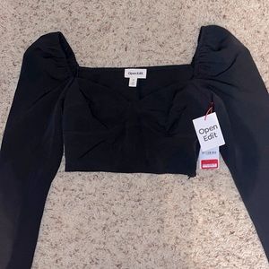 Black cropped long sleeve top
